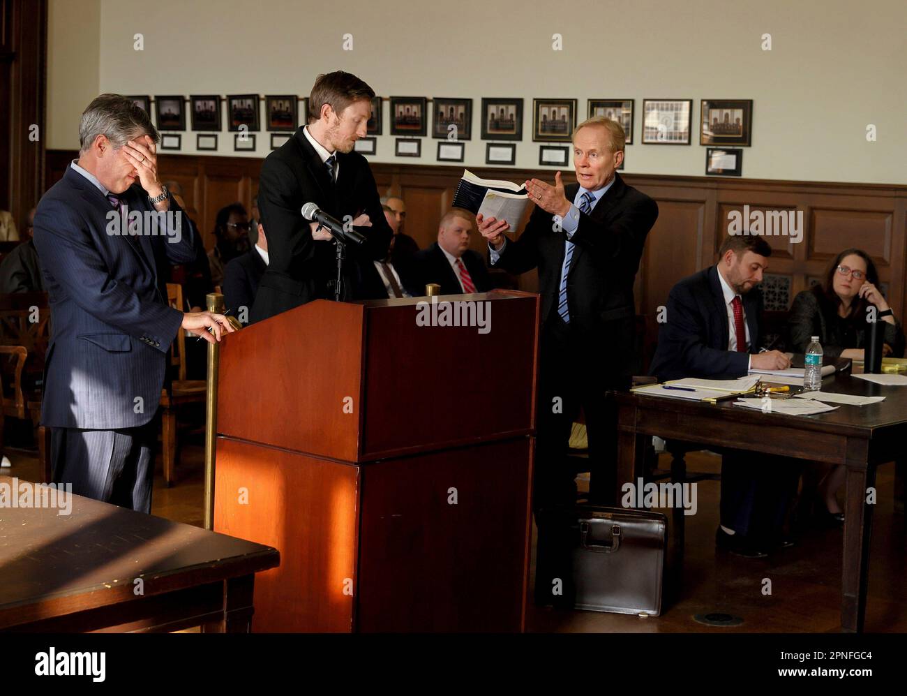 Attorney Jonathan Sternberg, left, reacts as Missouri Deputy Attorney