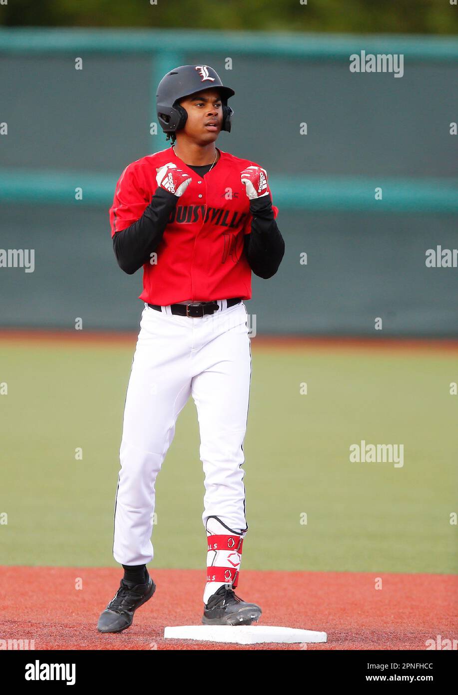BLOOMINGTON, IN - APRIL 18: Louisville infielder Noah Smith (14) reacts  after connecting for a double during a college baseball game between the  Louisville Cardinals and the Indiana Hoosiers on April 18,