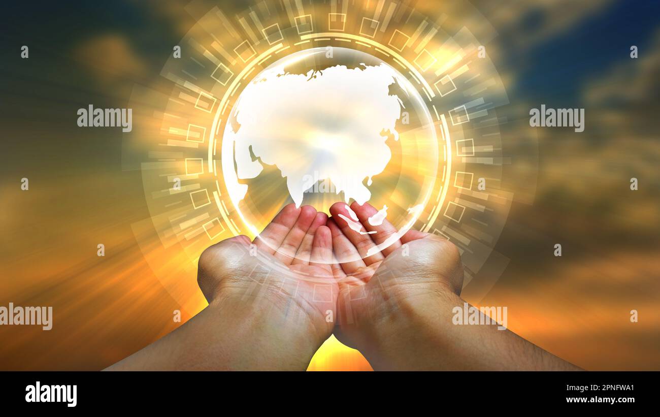 Hands holding earth globe orange hi-res stock photography and images ...