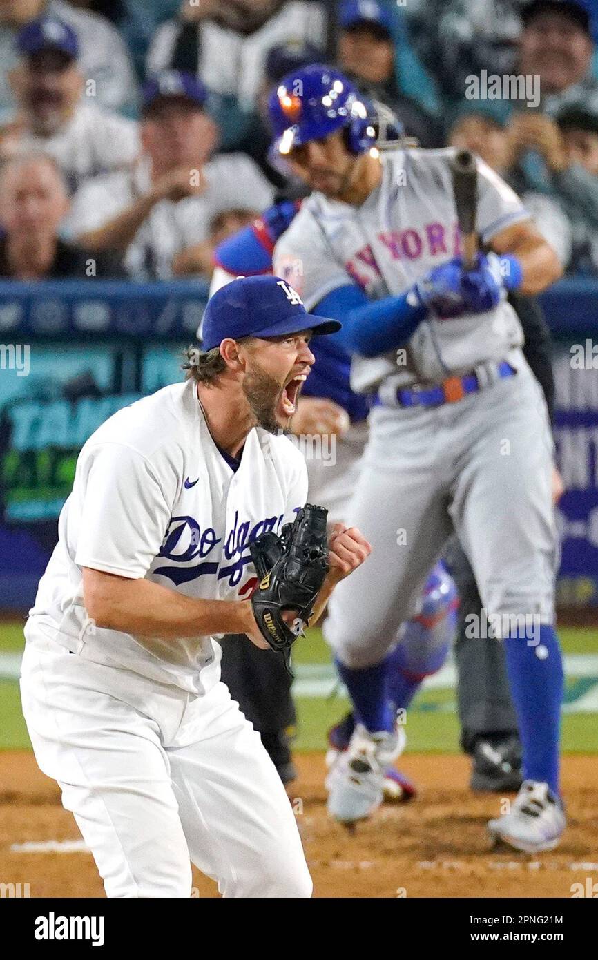 Los Angeles Dodgers' starting pitcher Clayton Kershaw, left, celebrates