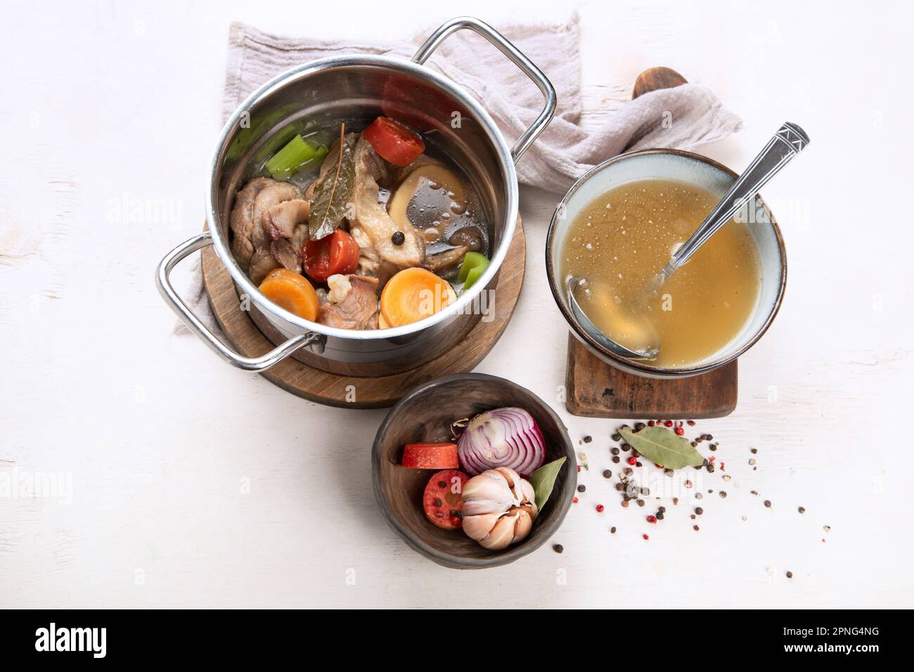 Beef broth of beef meat on bones slow cooked with vegetables carrot