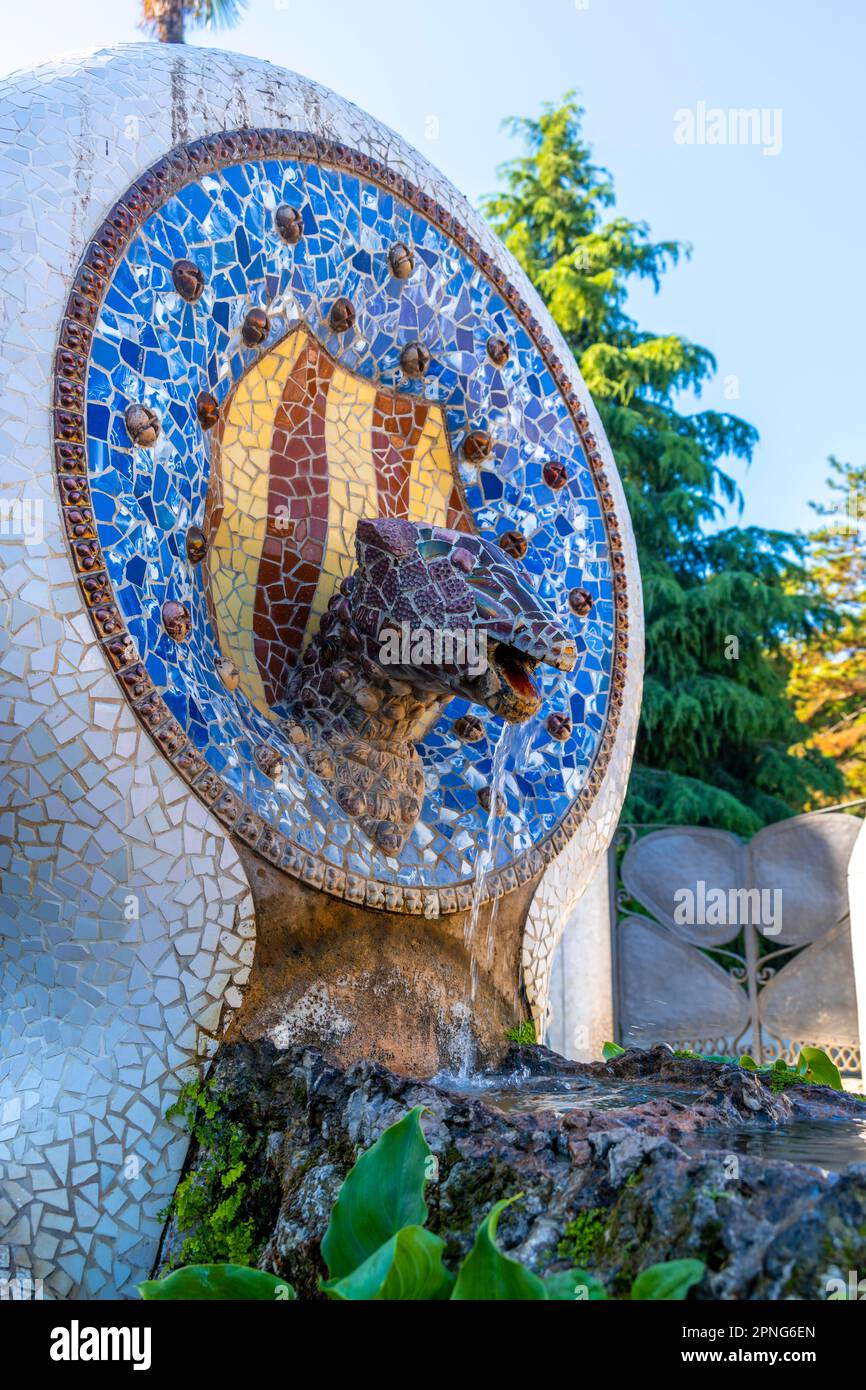 Fountain with mosaic at the entrance steps, Park Gueell, park by Antoni Gaudi, Catalonia, Spain Stock Photo