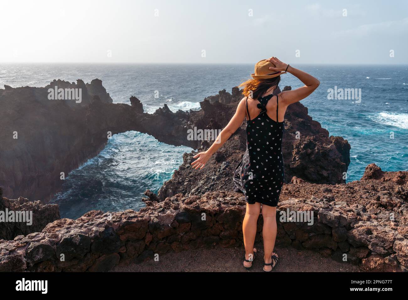 El Hierro Island. Canary Islands, a young tourist visiting the Arco de la Tosca Stock Photo