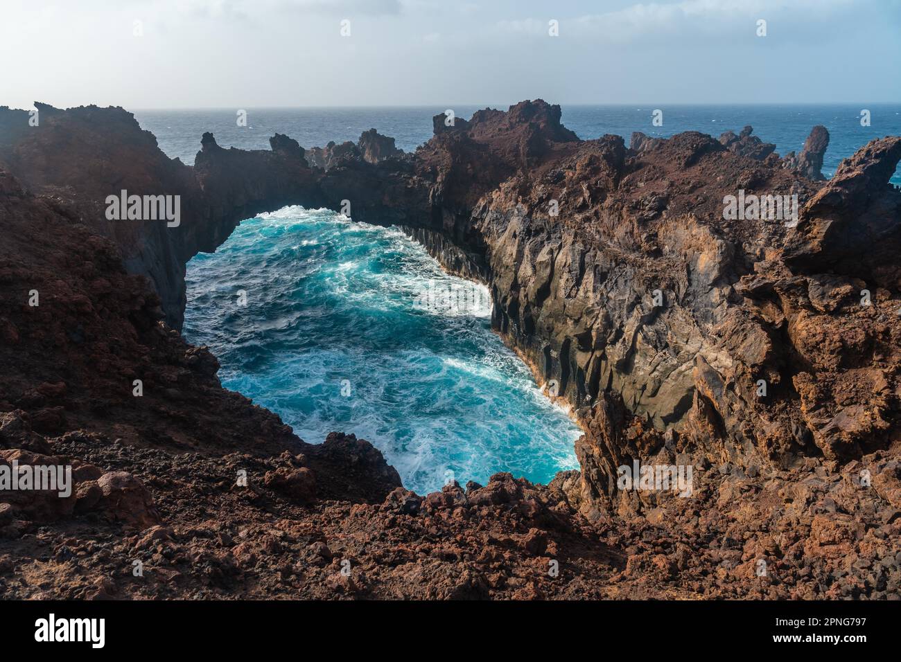 El Hierro Island. Canary Islands, the Arco de la Tosca incredible natural monument of an arch by the sea Stock Photo