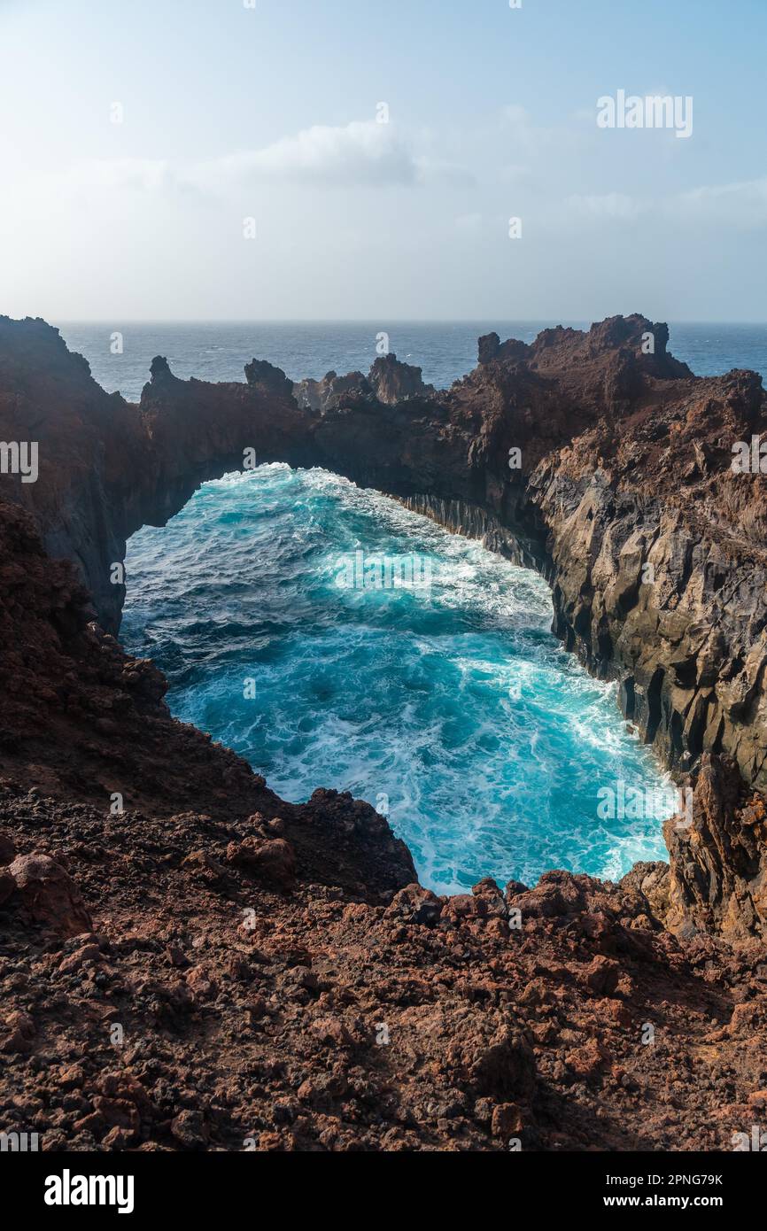 El Hierro Island. Canary Islands, the Arco de la Tosca incredible natural monument of an arch by the sea Stock Photo