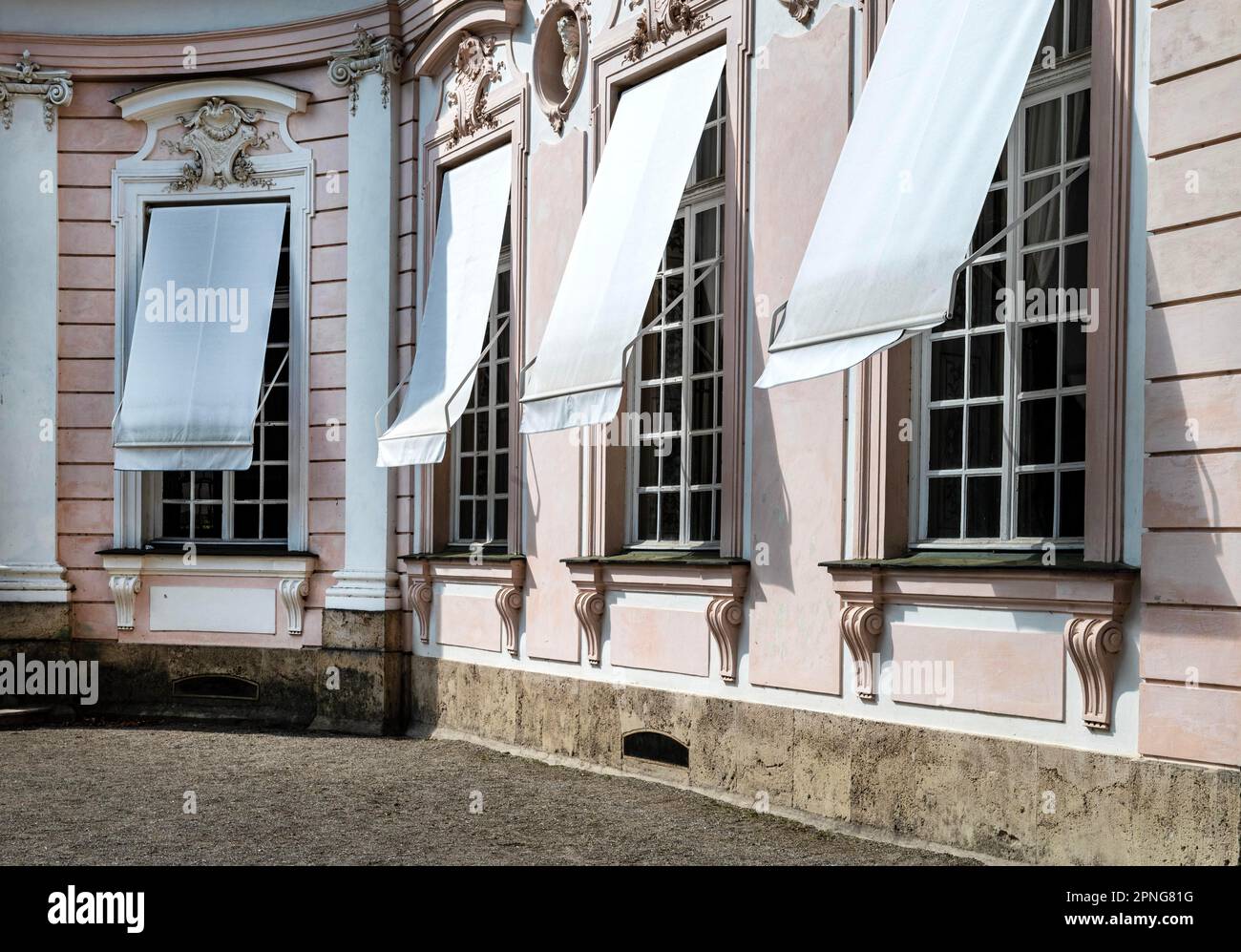 Windows of the Amalienburg with awnings in Nymphenburg Palace Park, Munich, Upper Bavaria, Germany Stock Photo