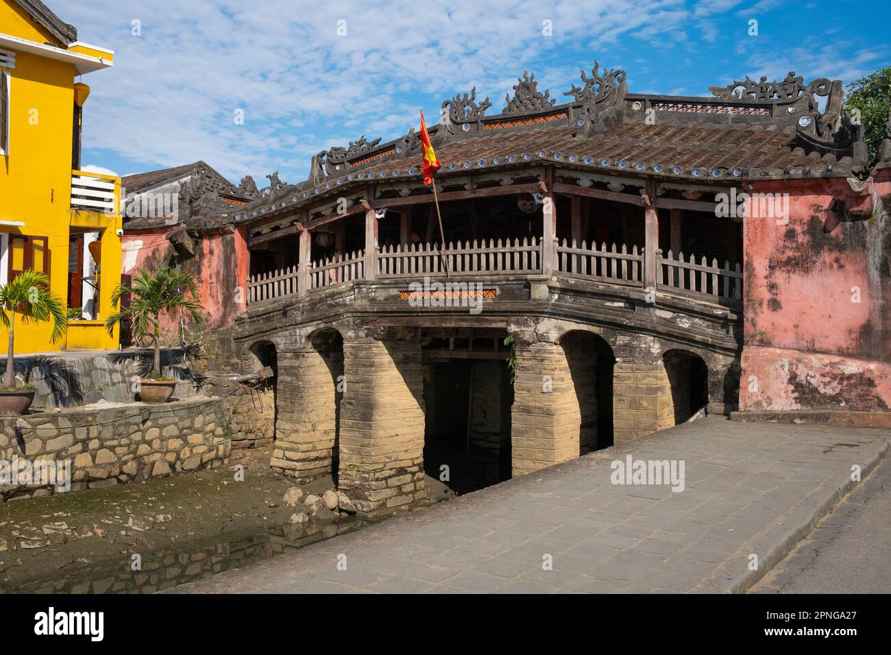 Vietnam: The Japanese Covered Bridge, Hoi An.  The Japanese Covered Bridge is a symbol of Hoi An and of its rich mercantile past. The bridge was built in 1593 by the Japanese trading community to link them with the Chinese quarter further to the east.  The small but historic town of Hoi An is located on the Thu Bon River 30km (18 miles) south of Danang. During the time of the Nguyen Lords (1558 - 1777) and even under the first Nguyen Emperors, Hoi An - then known as Faifo - was an important port, visited regularly by shipping from Europe and all over the East. Stock Photo