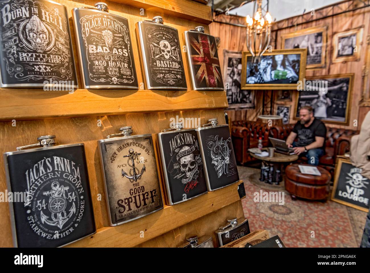 Illustrated hip flasks for bikers, drinking bottle, flask, hip flask, exhibition stand Jacks Inn 54 Roadwear, iMOT international motorbike Stock Photo