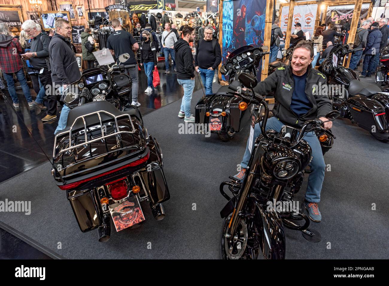 Man sitting on a HarleyDavidson FLHRXS Road King Special, House of