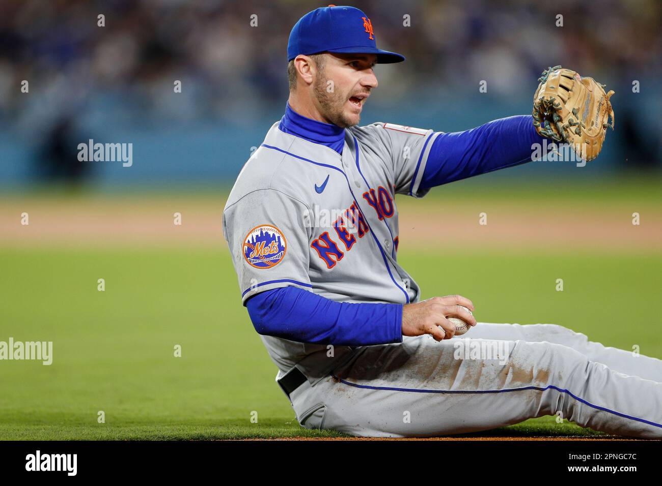 New York Mets first basemen Pete Alonso (20) gestures to the umpire ...