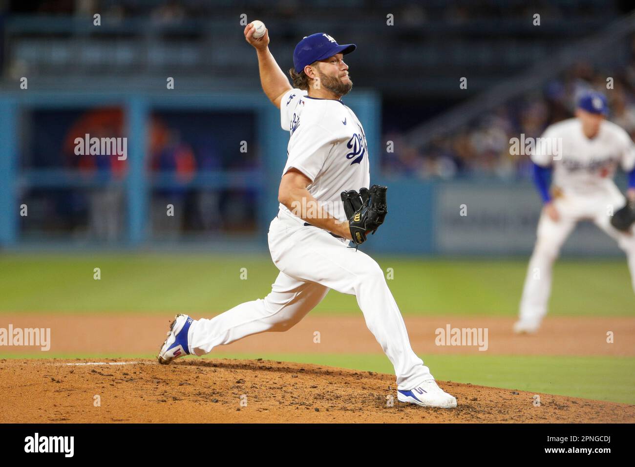 Los Angeles Dodgers starting pitcher Clayton Kershaw (22) throws to the