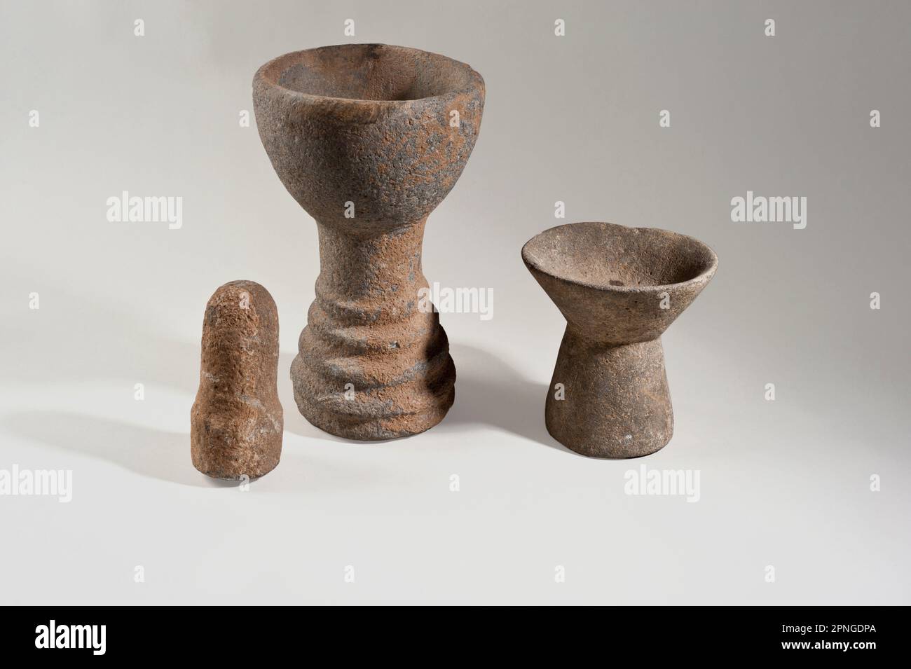 A Chalcolithic (Copper age) Basalt pedestalled bowl with pestle. 4th