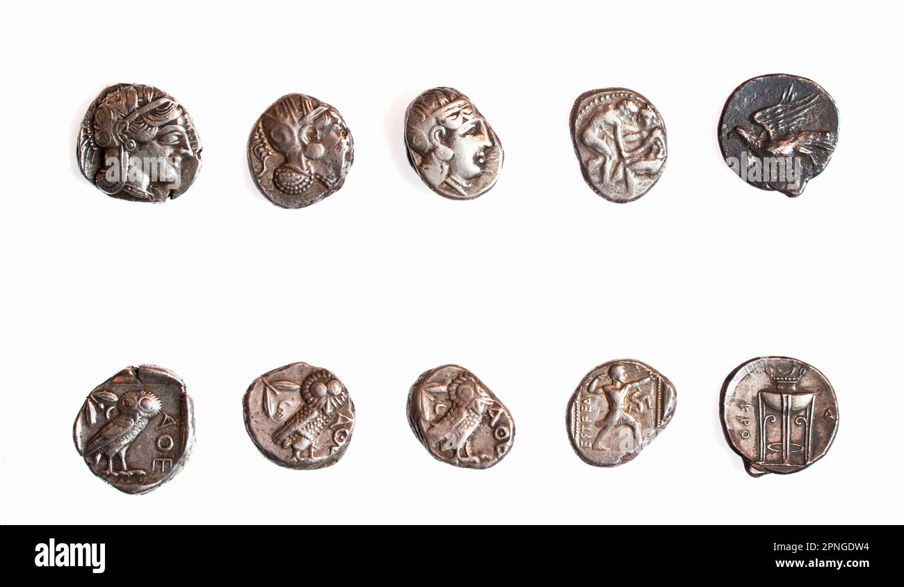 Ancient Greek coins 3rd - 4th century BCE. Left to right. 1. Athena 5th Century BCE. 2. Athena 4th Century BCE. 3. Athena 4th Century BCE. 4. Pamphili Stock Photo