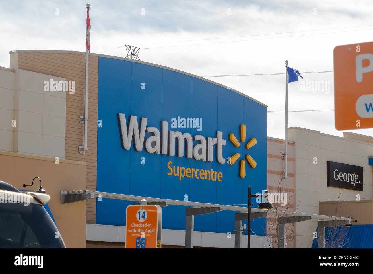 Calgary, Alberta, Canada. Apr 18, 2023. A Walmart sign on a location store. Stock Photo