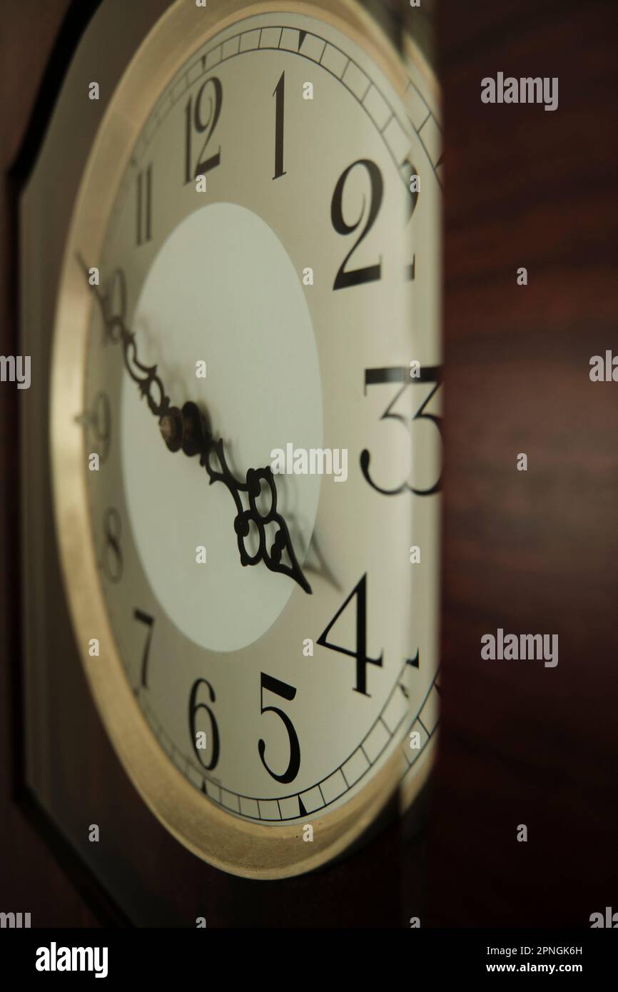 Grandfather clock showing quarter to four Stock Photo