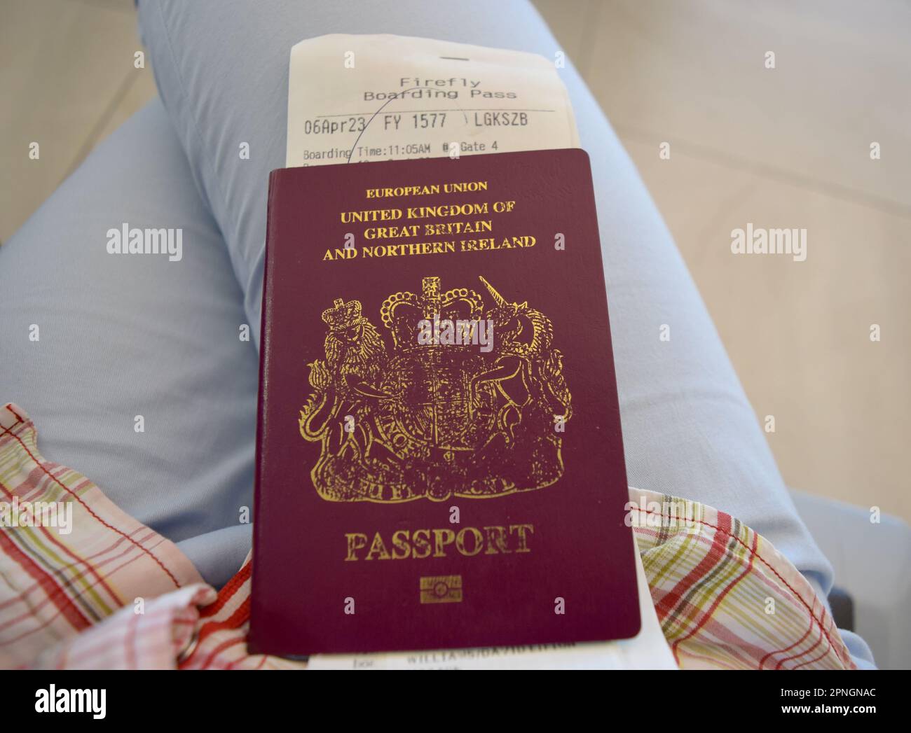 British passport and Firefly airline ticket from Langkawi to KL Stock