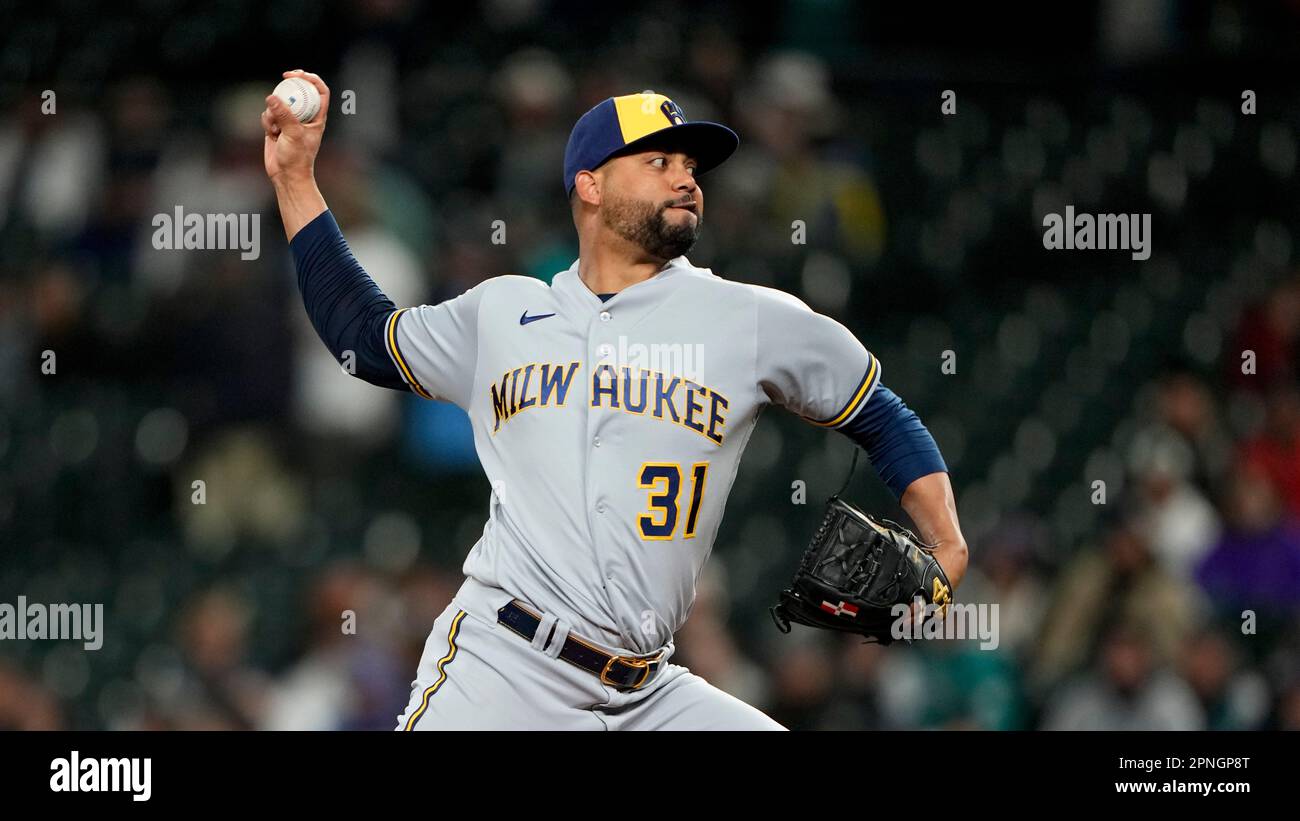 Milwaukee Brewers relief pitcher Joel Payamps throws against the