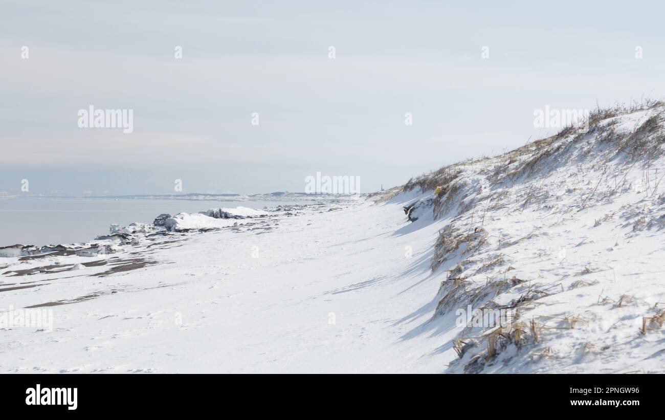 Snow on sandy beach and dunes in winter, Hokkaido, Japan Stock Photo ...