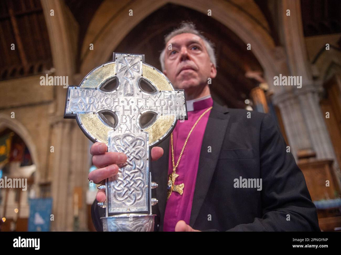 Archbishop of Wales Andrew John with The Cross of Wales ahead of a ...