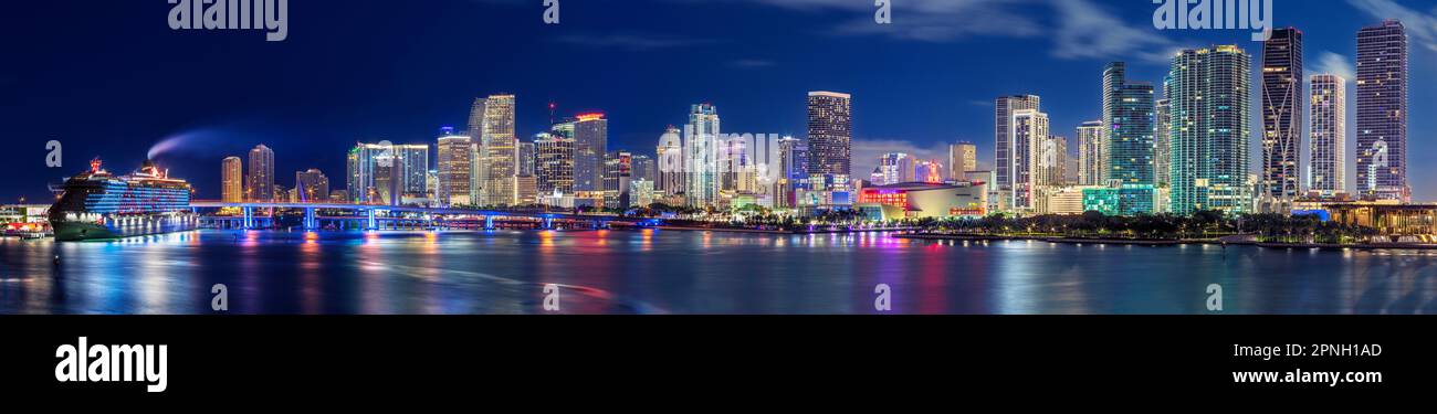 Skyline Panoramic of Miami Downtown at Dawn,  illuminated Virgin Voyage Cruise illuminated with AHOY in blue and red  Floridas East Coast Miami Florid Stock Photo