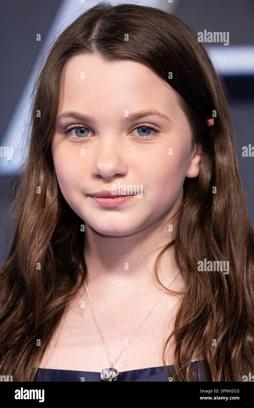 Caoilinn Springall poses for photographers upon arrival at the premiere