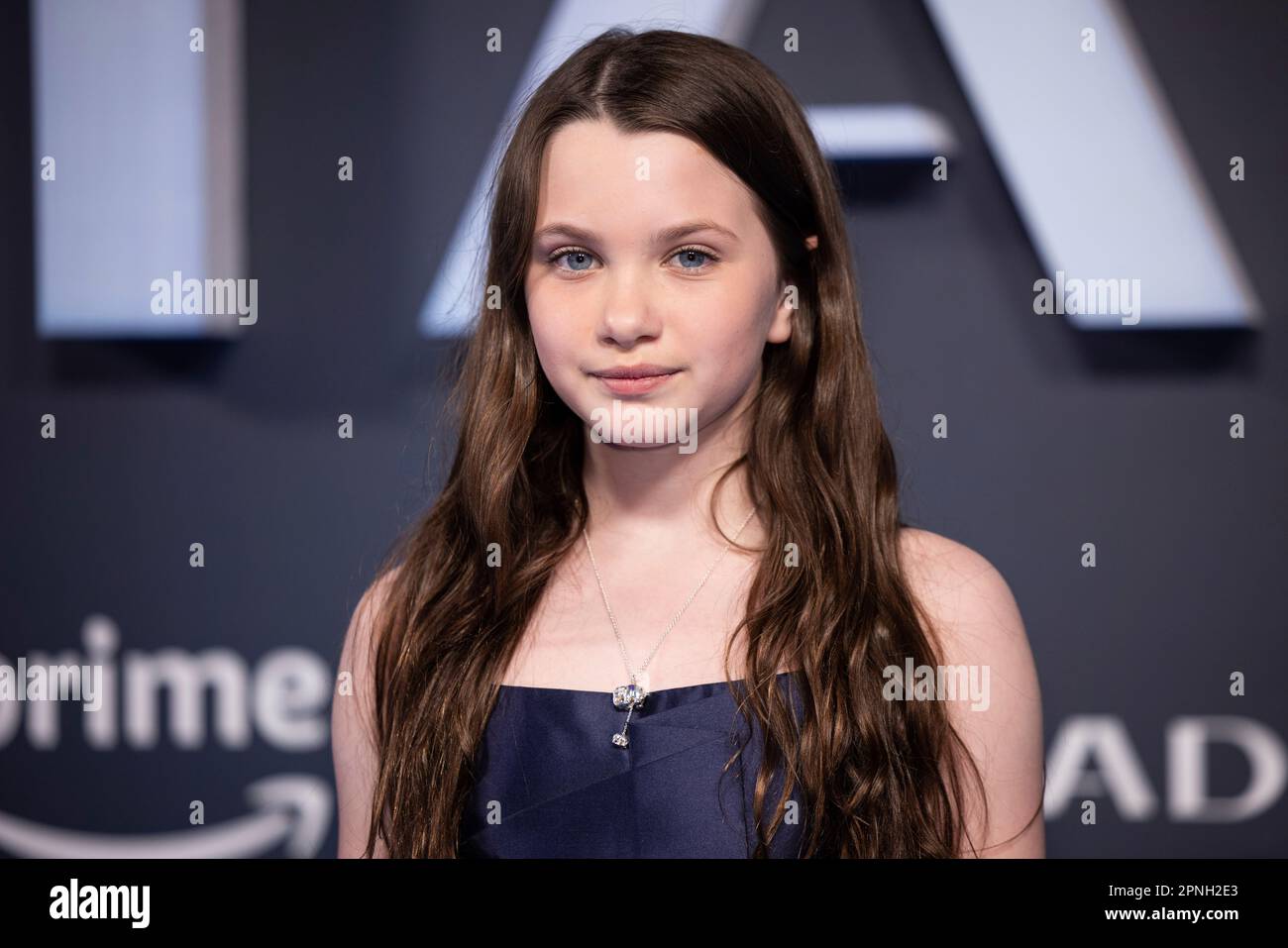 Caoilinn Springall poses for photographers upon arrival at the premiere