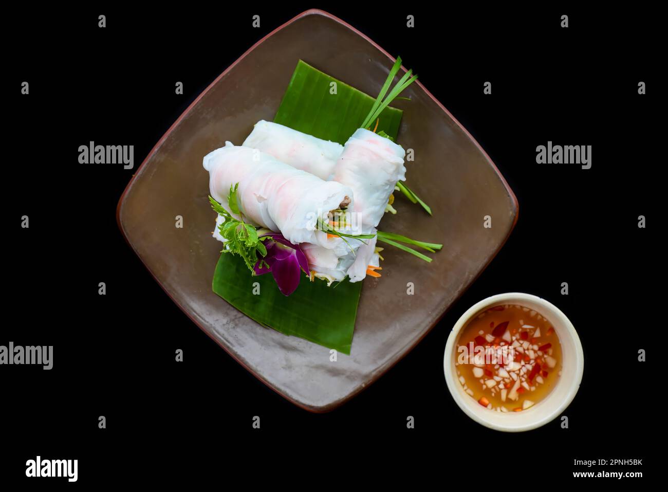 Vietnamese Pho spring roll with seafood, tofu, vegetables isolated on ...