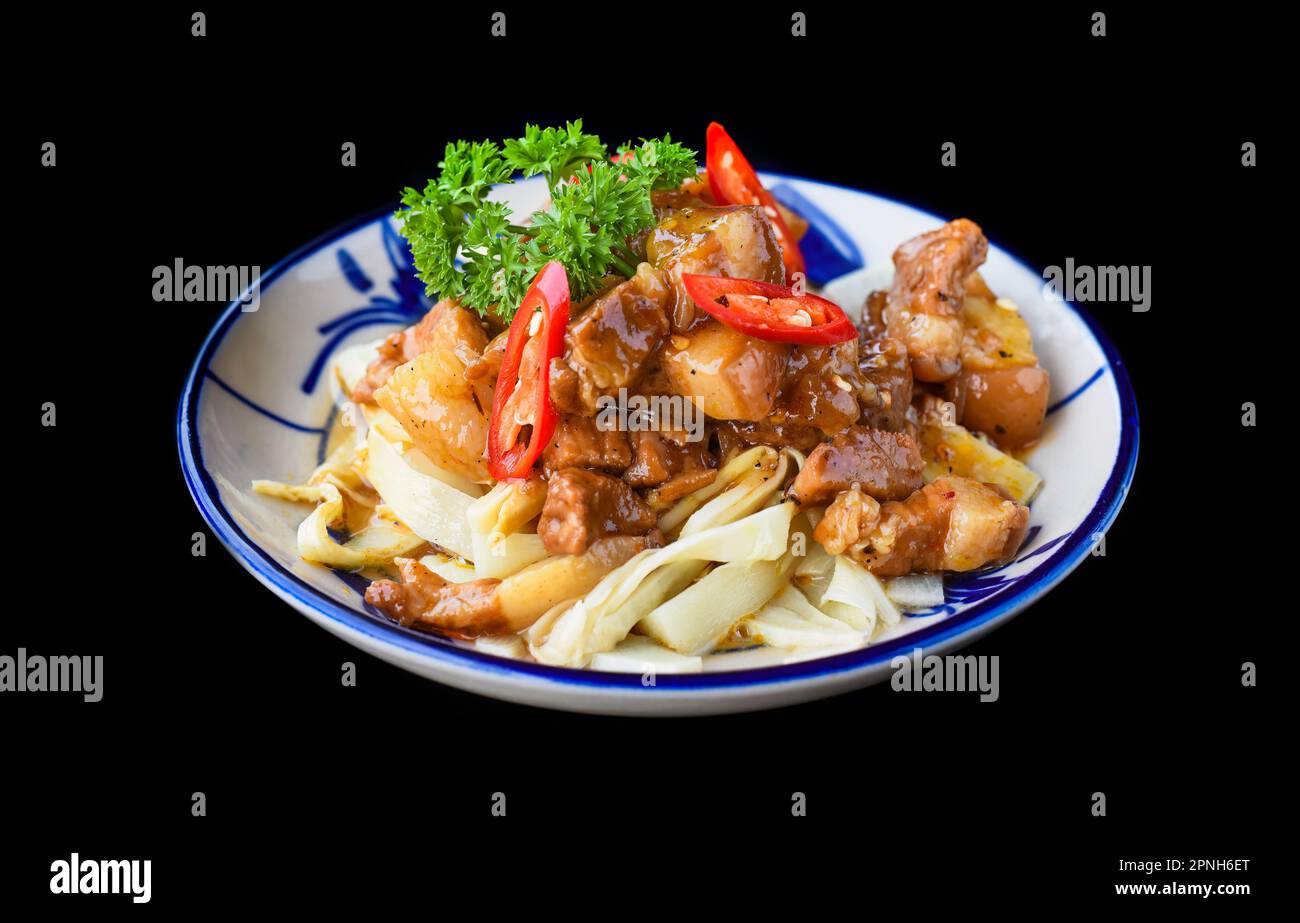 Vietnamese fried pork with ginger on black background Stock Photo Alamy