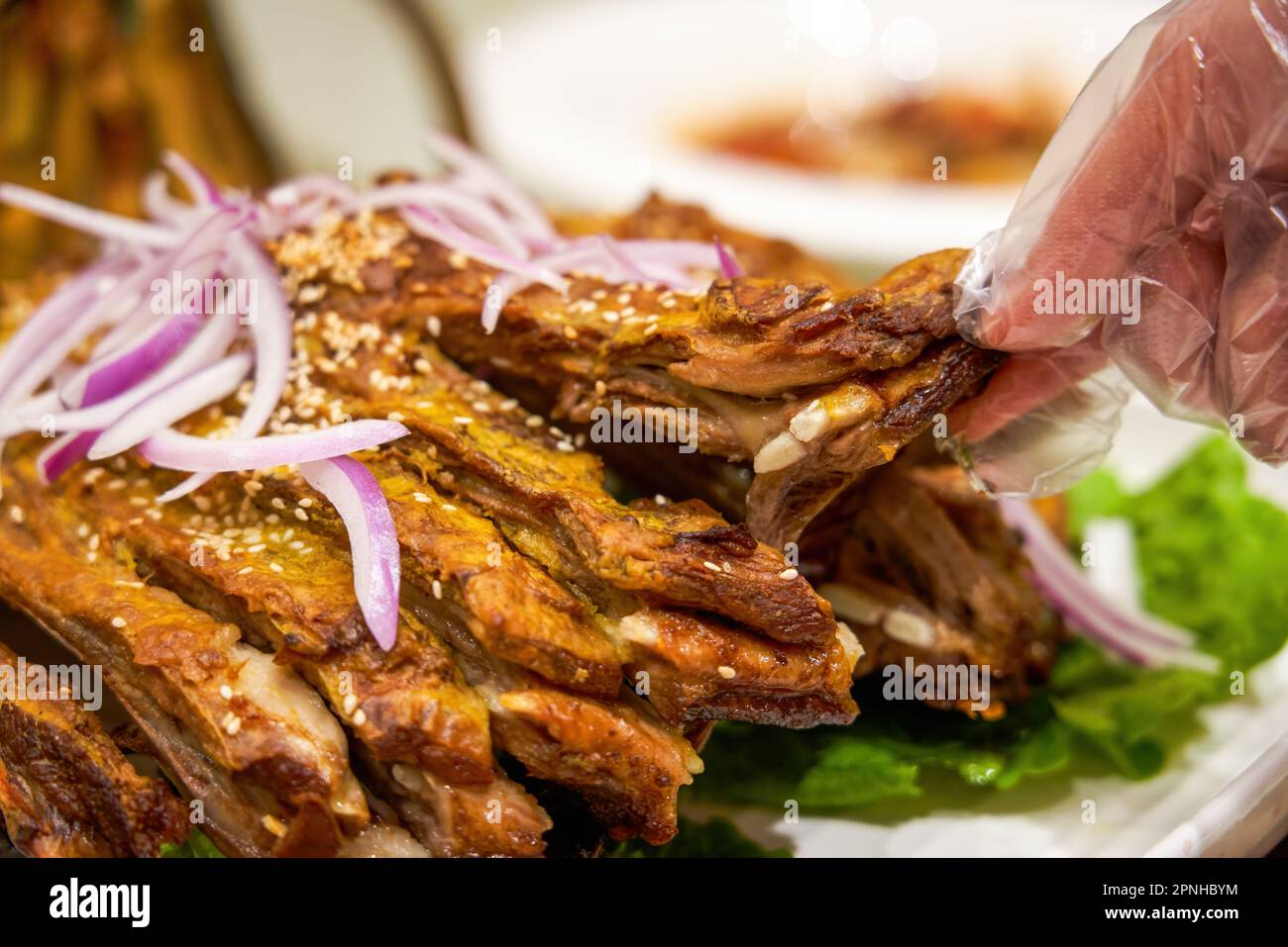 A delicious Chinese Xinjiang dish, grilled lamb chops Stock Photo Alamy