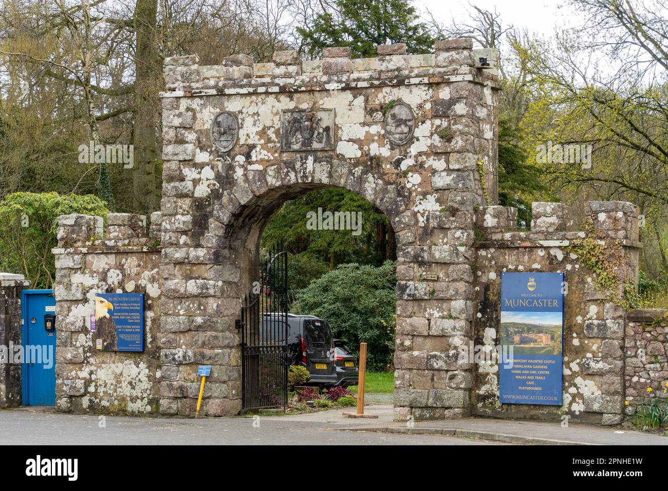 Entrance gate to Muncaster Castle, a popular tourist attraction near Ravenglass, The Lake District, Cumberland, UK. Stock Photo