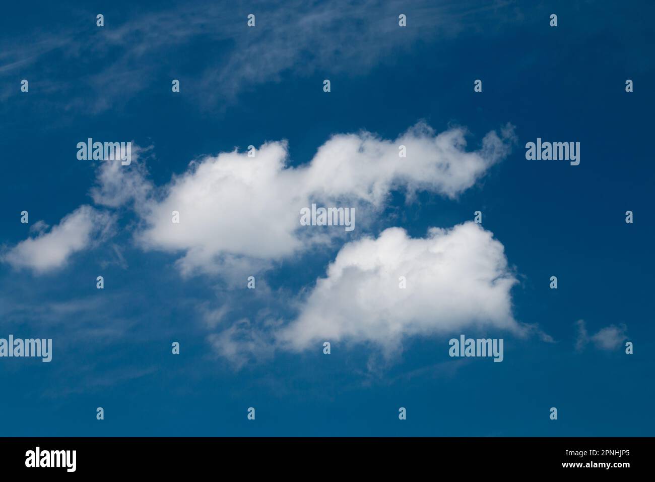 Big white clouds against the blue sky Stock Photo - Alamy