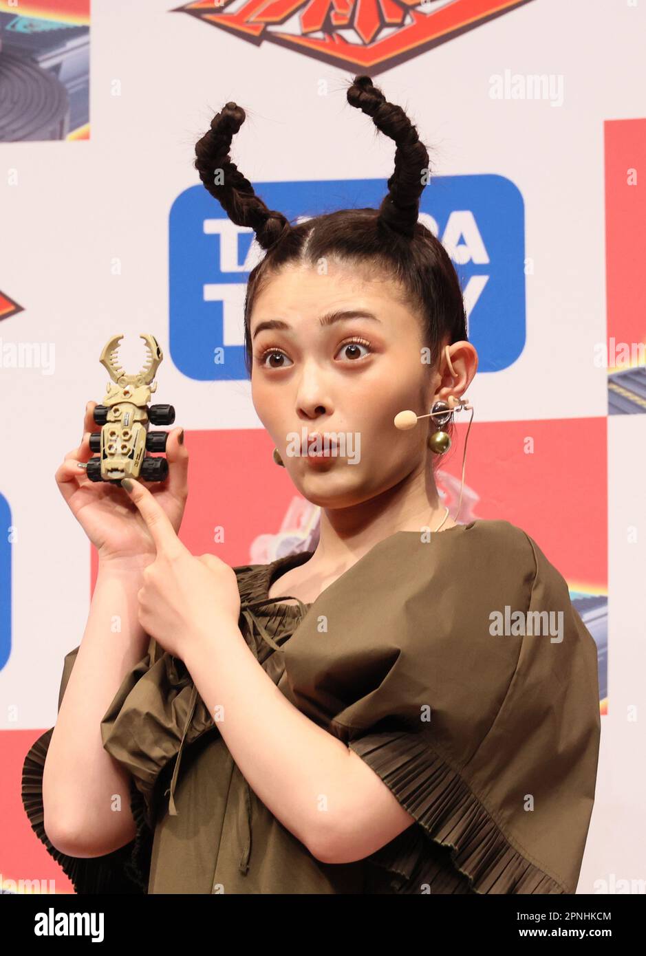 Tokyo, Japan. 19th Apr, 2023. Japanese actress Sakura Inoue displays Japanese toy maker Tomy's new battle insect toy 'Kabuto Borg' at a promotional event in Tokyo on Wednesday, April 19, 2023. Kabuto Borg is fight game on a board with two beetle shaped toys. (photo by Yoshio Tsunoda/AFLO) Stock Photo