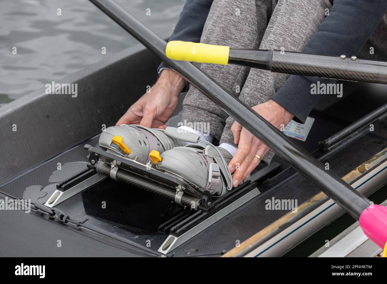 Great Britain's Beach Rowing classes at Redgrave and Pinsent Rowing Lake, Caversham, Reading. Pic shows Simon Briggs securing his feet in the boat. Stock Photo