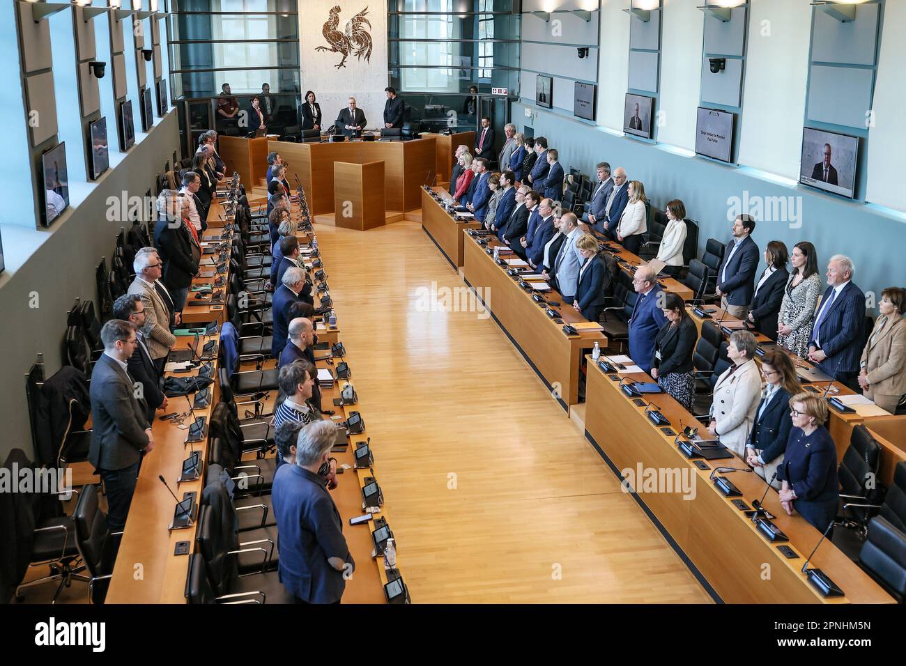 Illustration picture shows show a minute of silence for PS' Paul Furlan who died last week at the age of 60 from a cancer, at the start of a plenary session of the Walloon Parliament in Namur, Wednesday 19 April 2023. BELGA PHOTO BRUNO FAHY Stock Photo