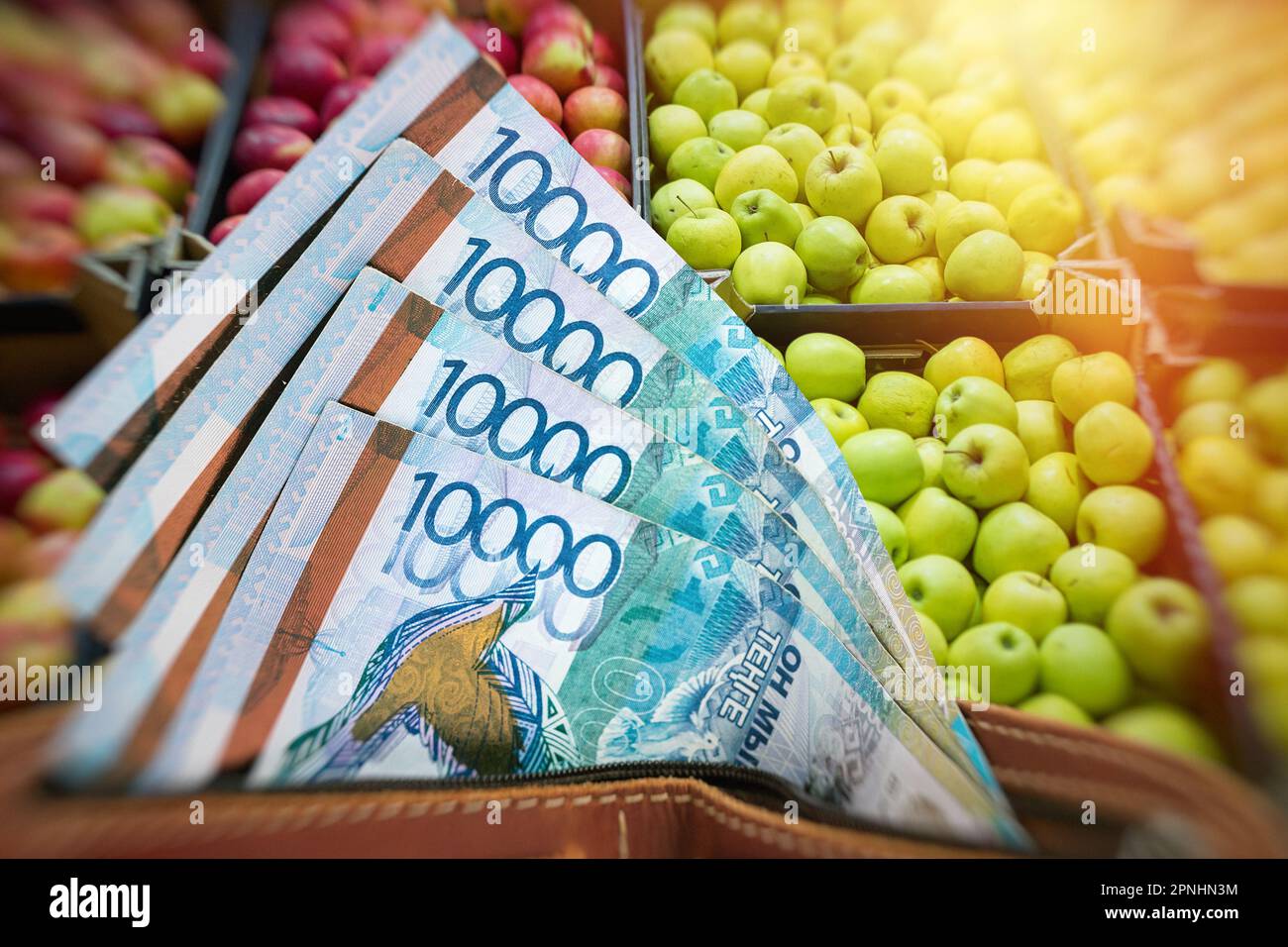Rising prices for fruits and agricultural products in Kazakhstan. Tenge in a wallet against the