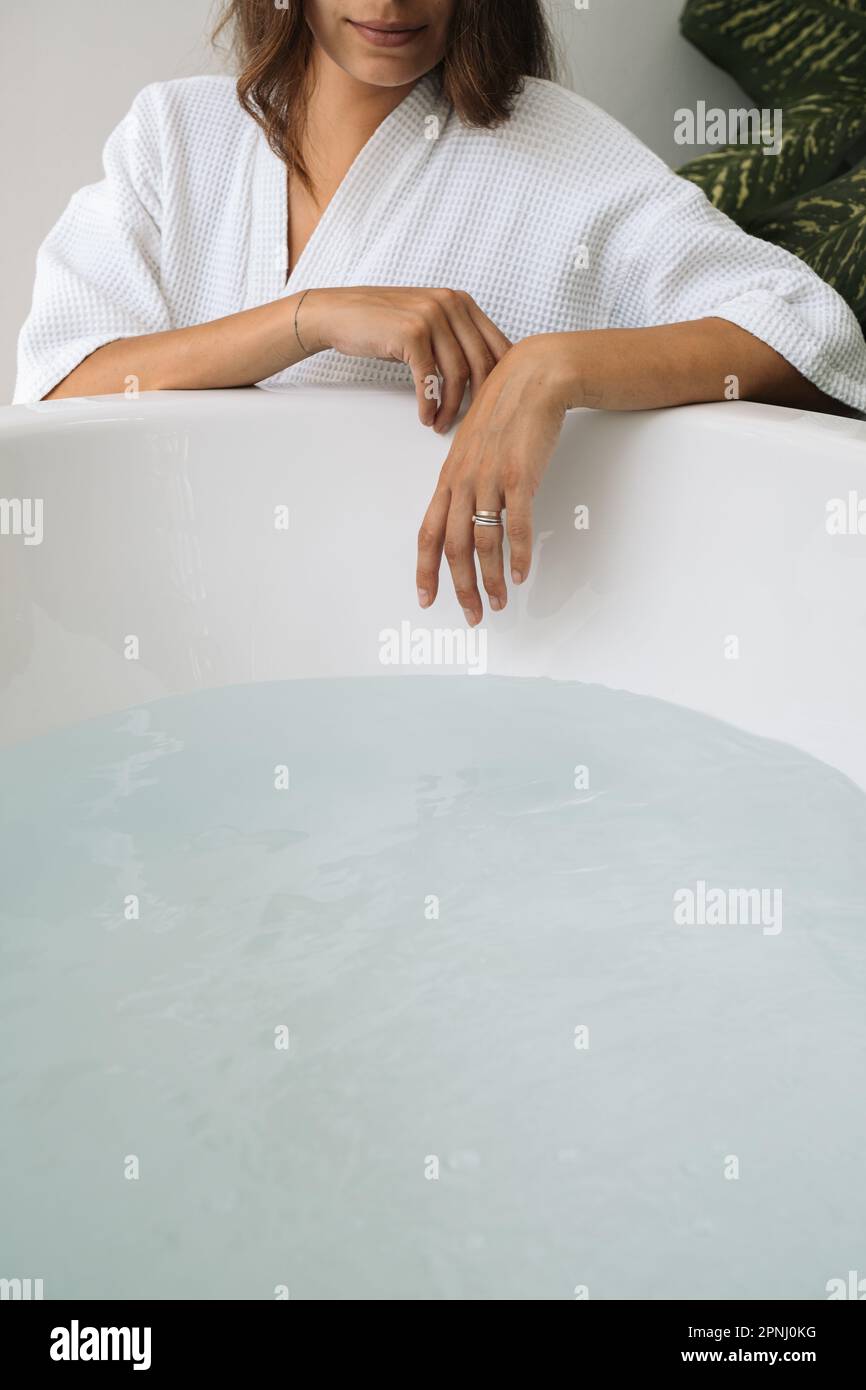 Pretty girl shaving legs in hires stock photography and images Alamy