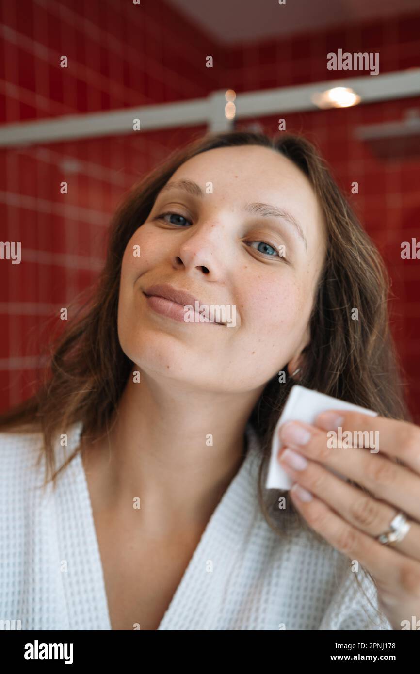 Pretty girl shaving legs in hires stock photography and images Alamy