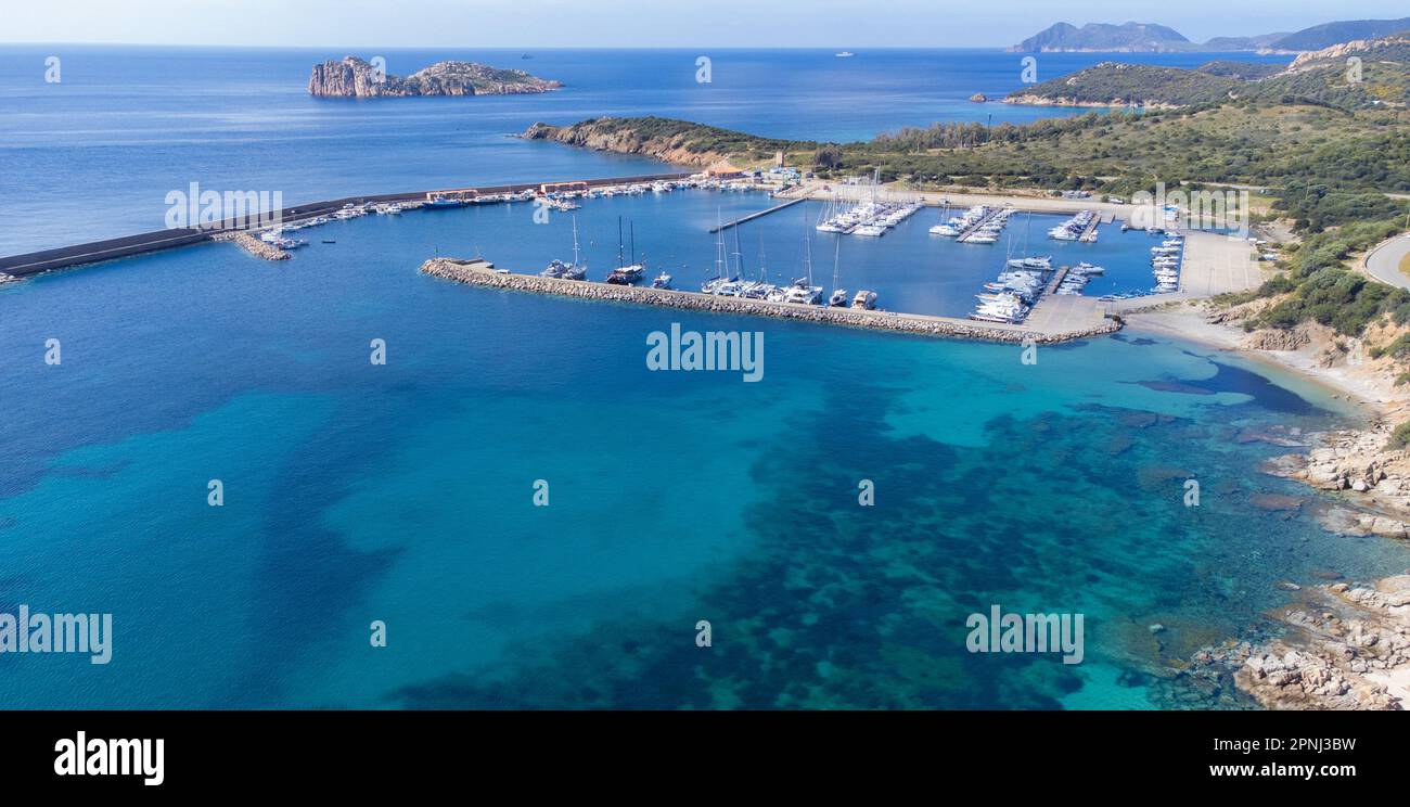 Port of teulada and aerial view of porto tramatzu beach in south sardinia Stock Photo