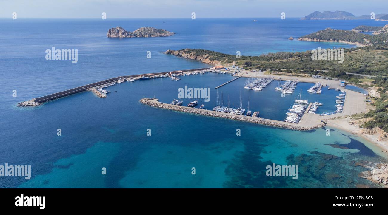 Port of teulada and aerial view of porto tramatzu beach in south sardinia Stock Photo