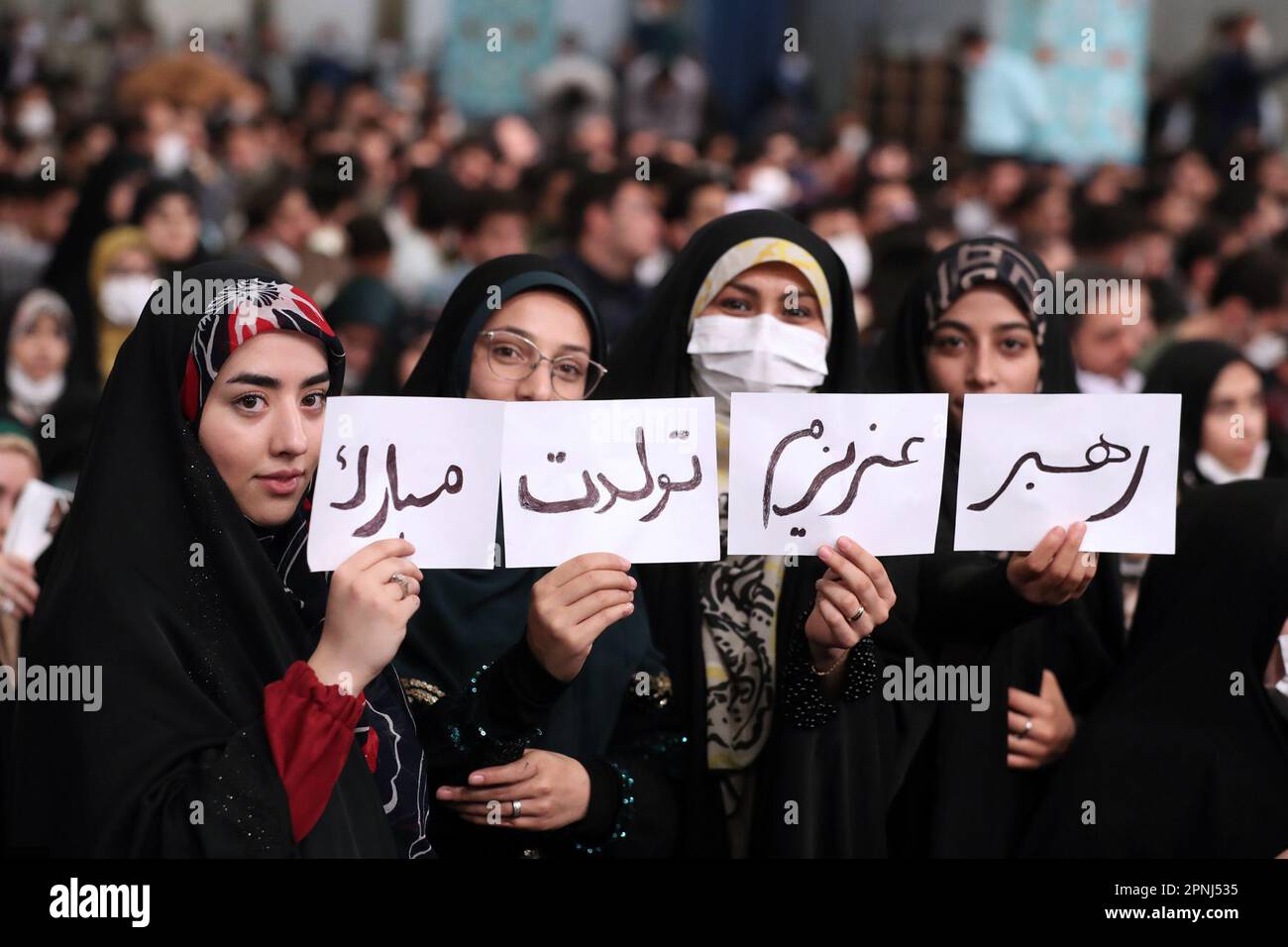 Tehran, Tehran, Iran. 19th Apr, 2023. Female students holding placards reading 'Happy birthday, my dear leader' as they attend a meeting with Iranian Supreme Leader Ayatollah Ali Khamenei (not pictured) in Tehran, Iran, 18 April 2023. Khamenei turns 84 on 19 April 2023. (Credit Image: © Iranian Supreme Leader'S Office via ZUMA Press Wire) EDITORIAL USAGE ONLY! Not for Commercial USAGE! Stock Photo