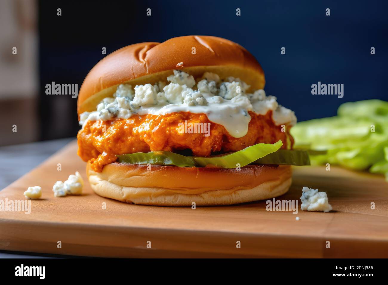 Buffalo chicken burger with blue cheese dressing and celery slaw Stock