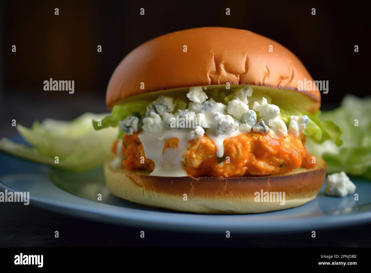 Buffalo chicken burger with blue cheese dressing and celery slaw