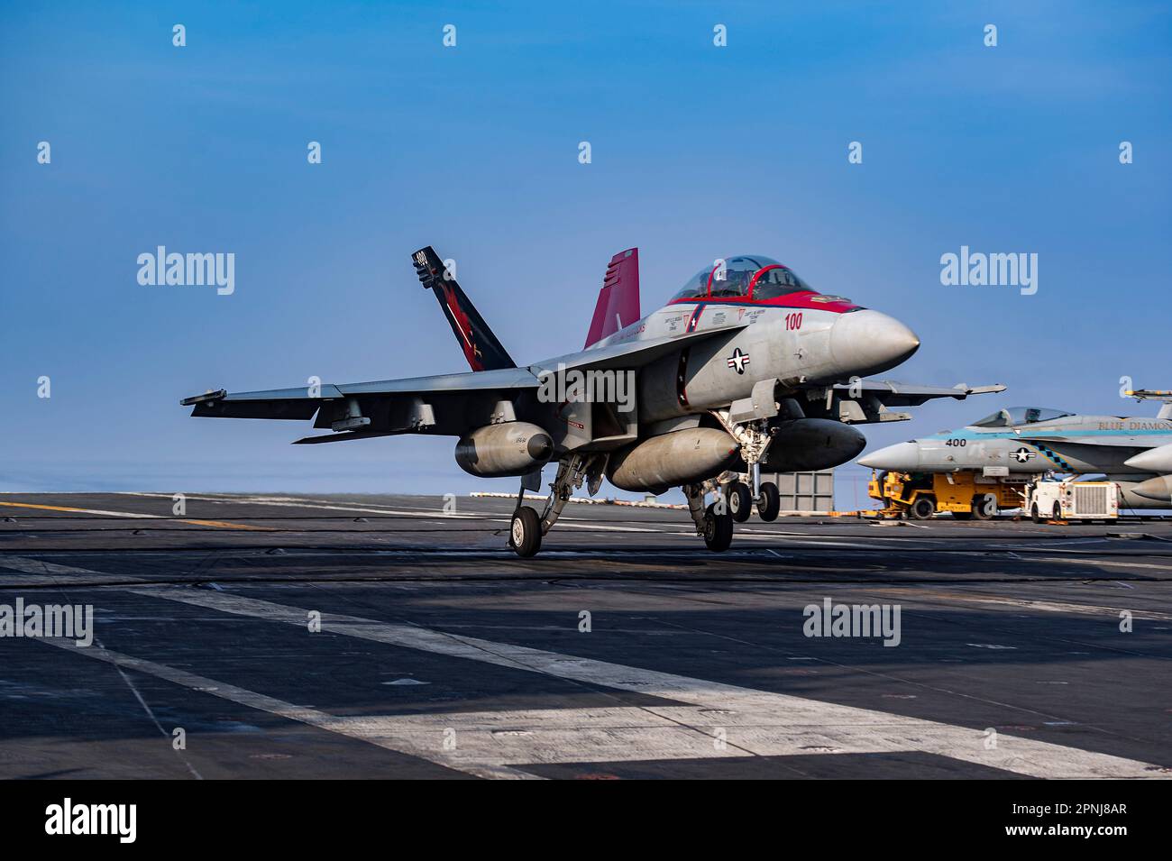 San Diego, United States. 17 April, 2023. A U.S Navy F/A-18F Super Hornet fighter aircraft, with the Fighting Redcocks of Strike Fighter Squadron 22 lands on the flight deck of the Nimitz-class aircraft carrier USS Nimitz, April 17, 2023 in the South China Sea.  Credit: MC2 Justin McTaggart/U.S. Navy/Alamy Live News Stock Photo