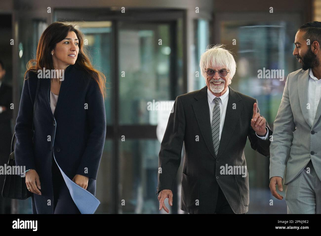 Former Formula One boss Bernie Ecclestone and his wife Fabiana Flosi leave Southwark Crown Court, London, after a hearing on charges of fraud by false representation over an alleged failure to declare £400 million of overseas assets to the Government. Picture date: Wednesday April 19, 2023. Stock Photo