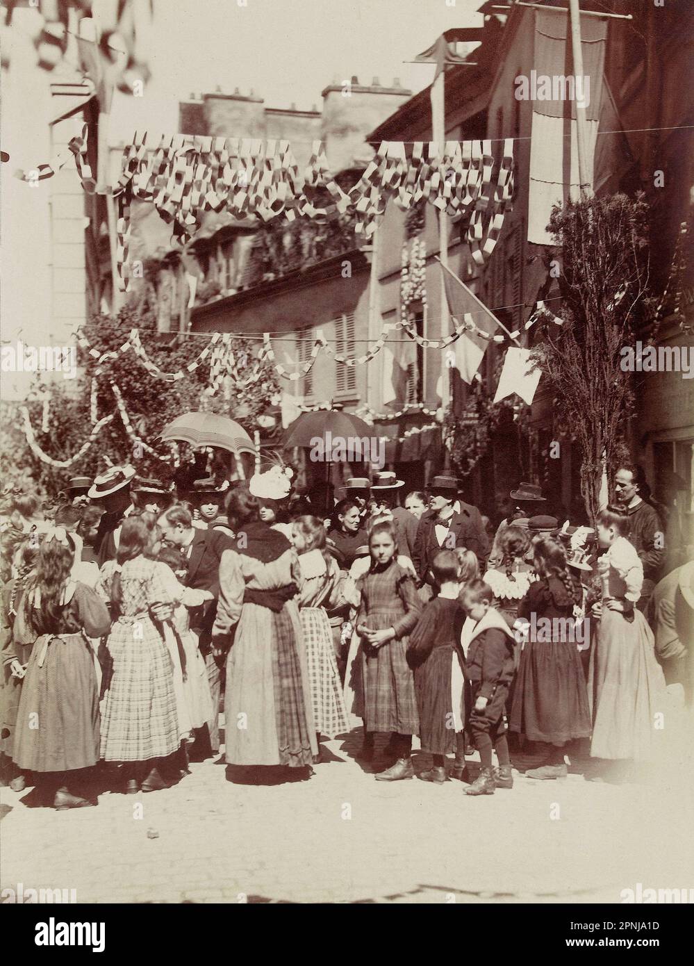 Photograph during the Festival of July 14, 1898, The String Game, Rue Broca by Atget Eugène Carnavalet Museum in Paris Stock Photo