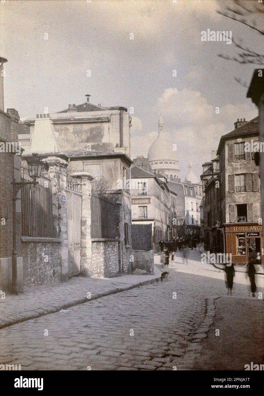 Photograph of the Basilica of the Sacred Heart of Montmartre seen from rue Norvins in the 18th arrondissement of Paris around 1915 - 1925, Musée Carnavalet de Paris Stock Photo