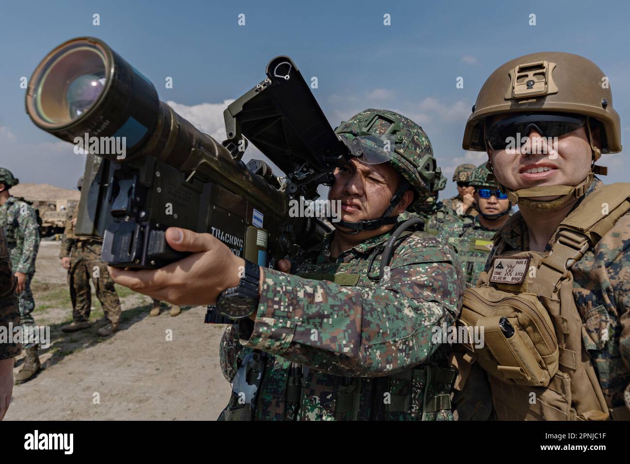 San Antonio, Philippines. 17th Apr, 2023. U.S. Marine Corps Lance Cpl. Bailey Parr, right, lookd on as a Philippine Marine prepares to fire a simulated FIM-92 Stinger surface-to-air missile during Balikatan 23, at Naval Station Leovigildo Gantioqui, Philippines, April 17, 2023 in San Antonio, Zambales, Luzon, Philippines. Credit: Cpl. Kyle Chan/U.S. Marine Corps/Alamy Live News Stock Photo