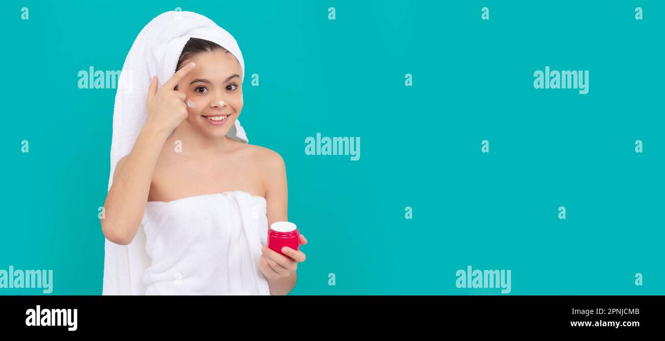 kid use face cream. tween girl hold hair mask. child with skin cream