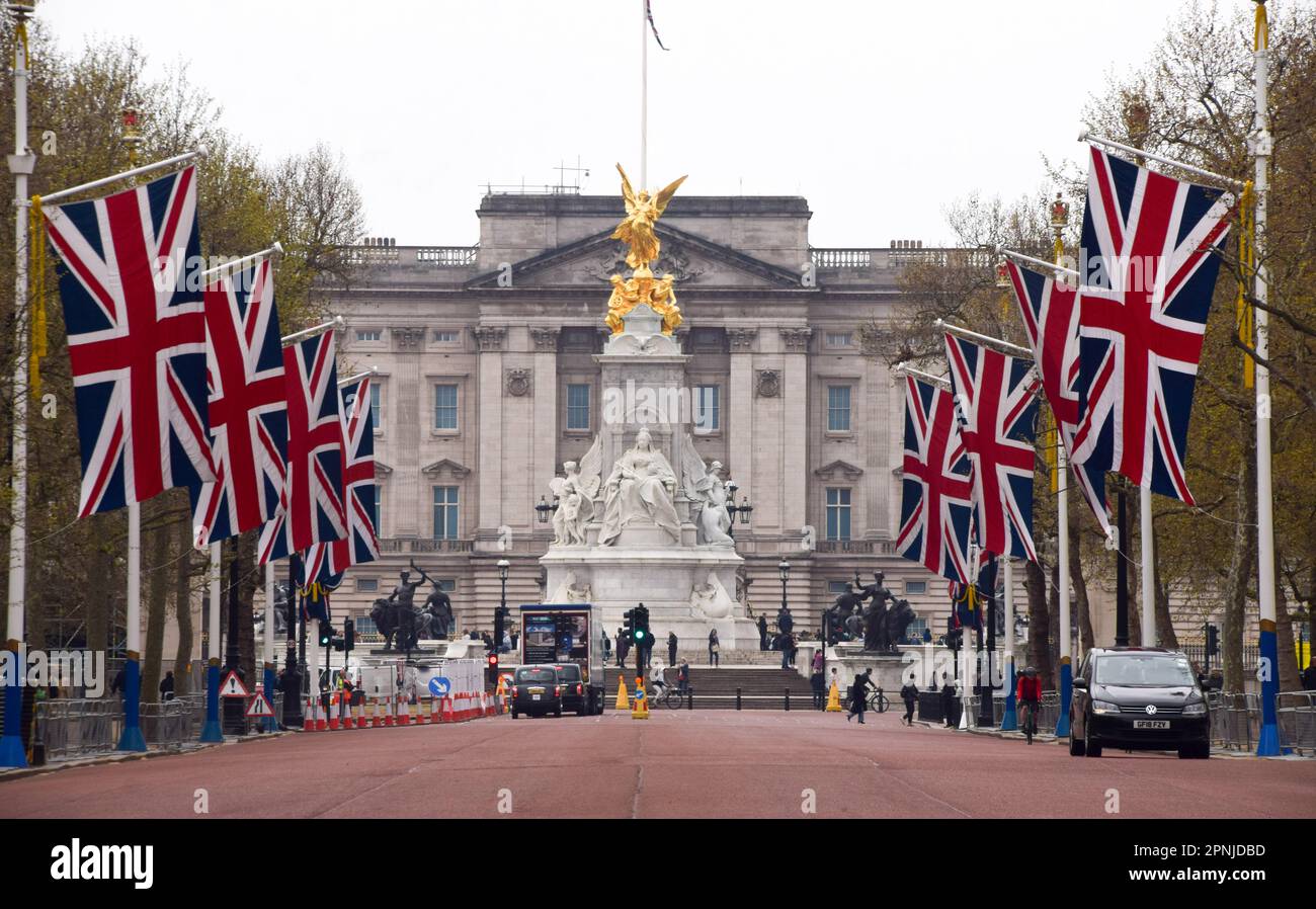 London, UK. 19th April 2023. More Union Jacks have been installed in The Mall as preparations for the coronation of King Charles III and Queen Camilla, which takes place on May 6th, continue around London. Stock Photo