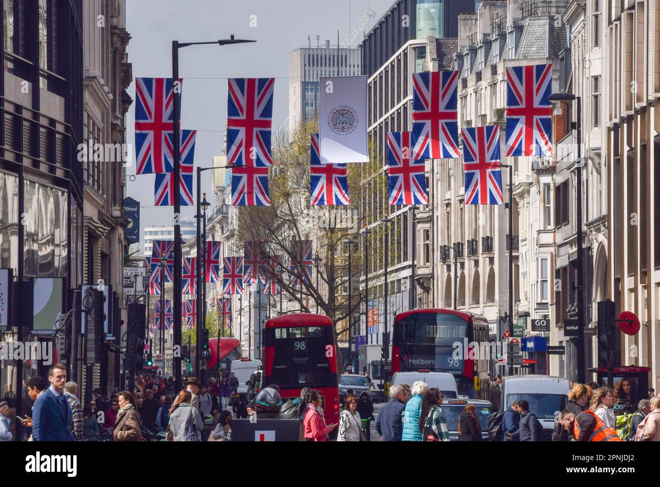 London, UK. 19th April 2023. Union Jacks have been installed in Oxford Street as preparations